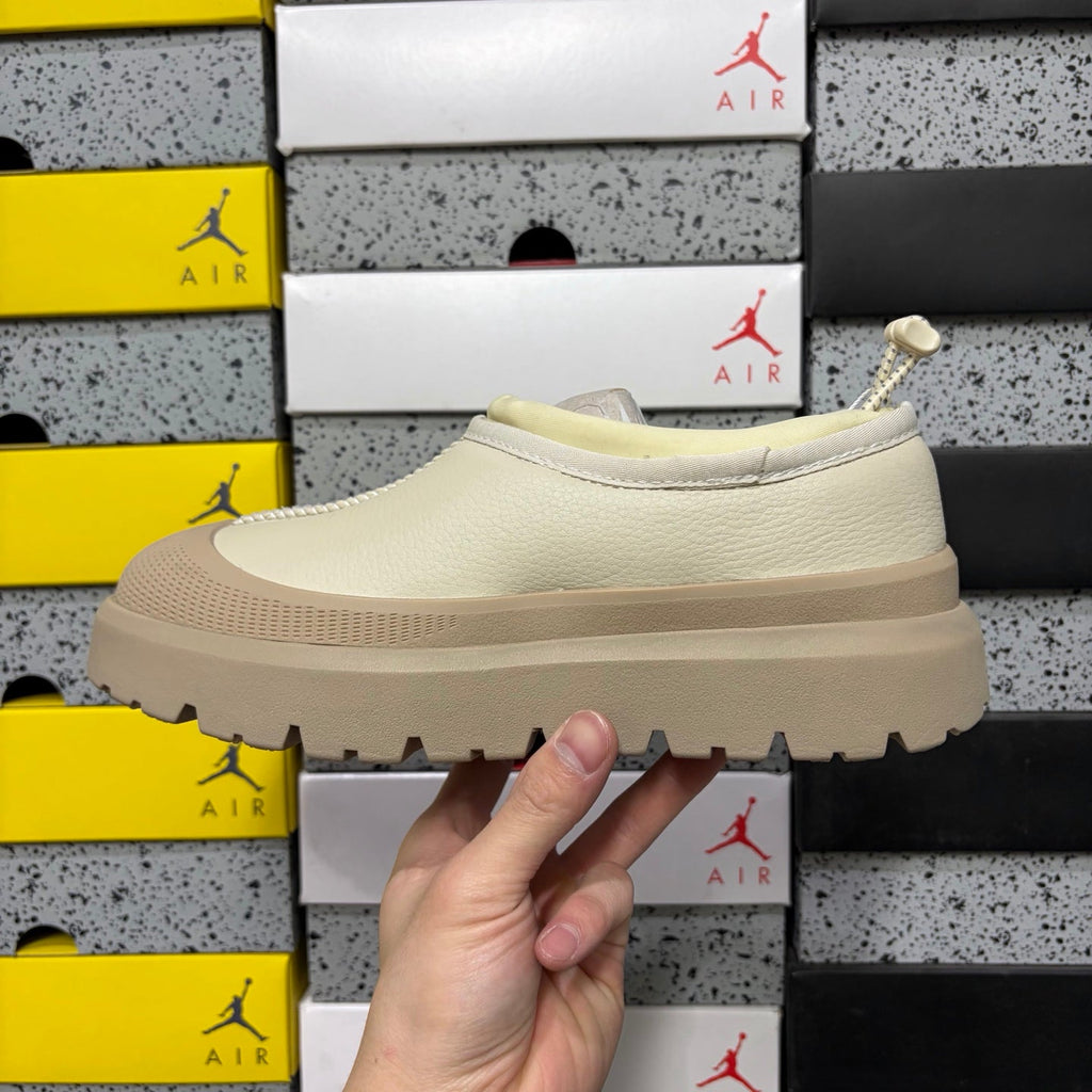 UGG Neumeel Deco Slip-On – Leather Moccasin Sneaker with Cream Lug Sole & Rope Drawstring in Cream